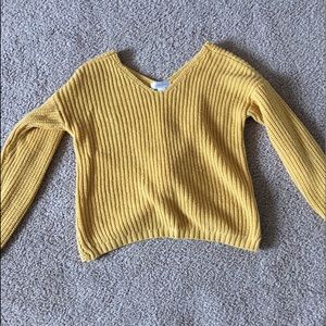 yellow used sweater.